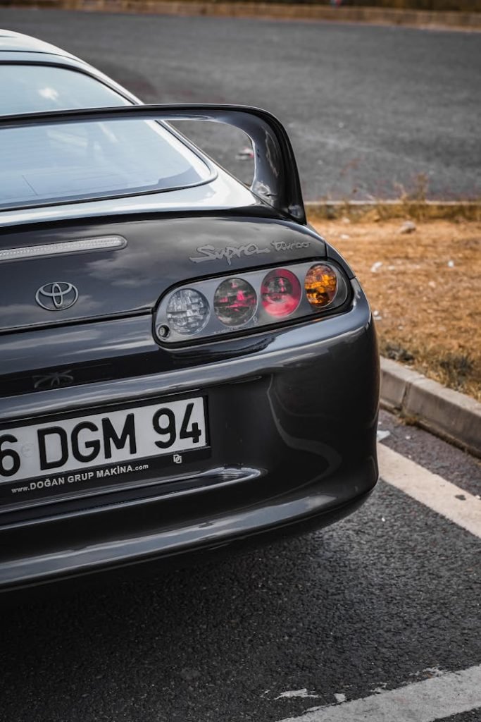 A sleek sports car showcased in an outdoor parking area in Istanbul, showcasing its distinctive design.